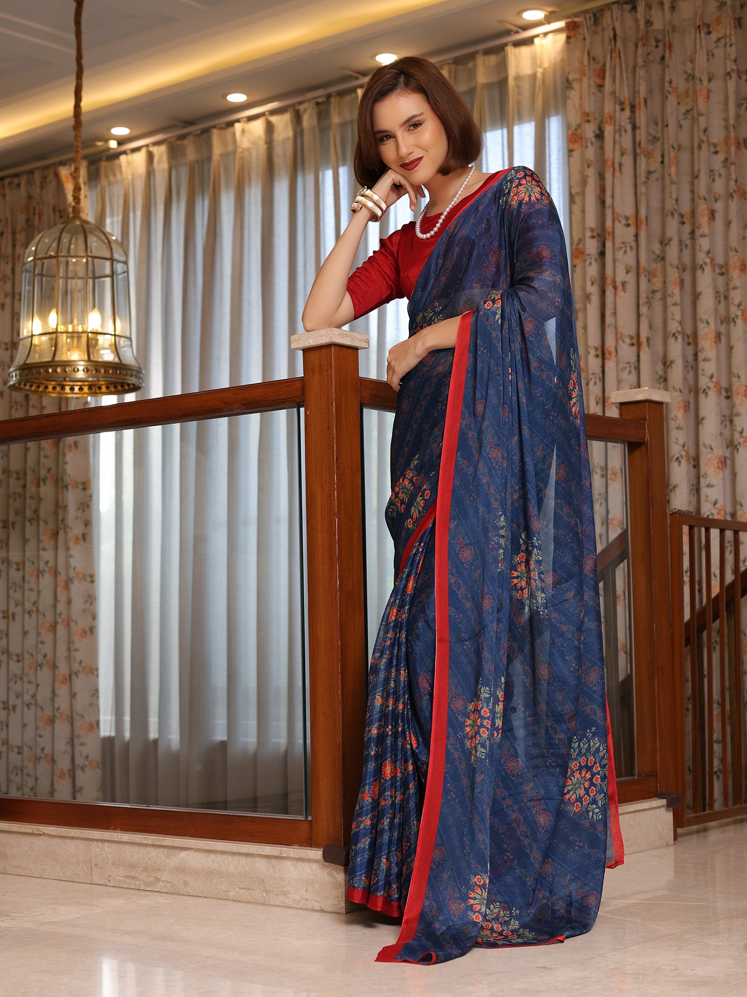 Evara Deep Navy Floral Buti Chinon Saree