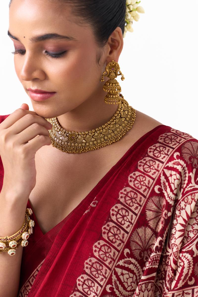 Traditional Gold Choker Necklace with Matching Jhumka Earrings – Floral Motif