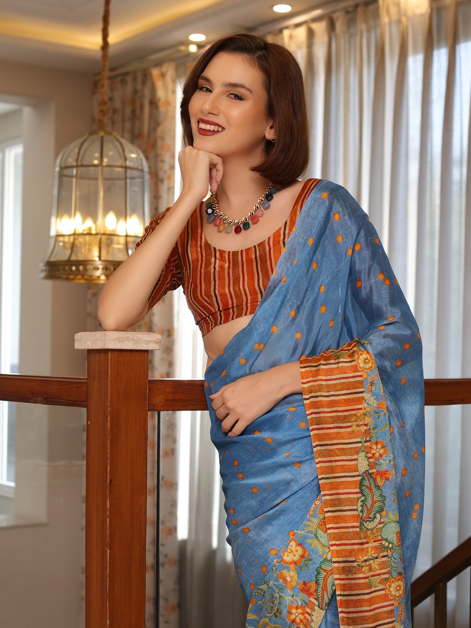 Aurelia Azure Blue and Rust Floral Buti Chinon Saree