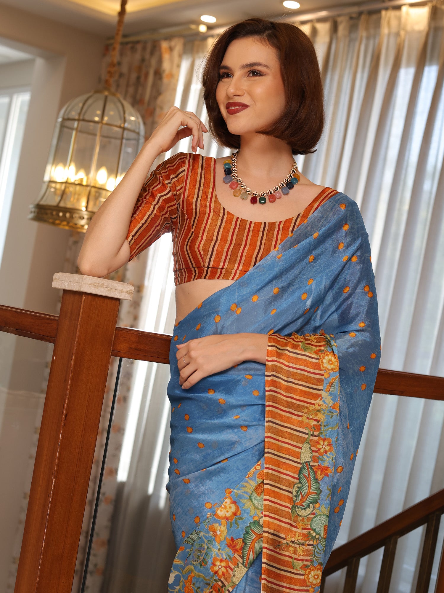Aurelia Azure Blue and Rust Floral Buti Chinon Saree