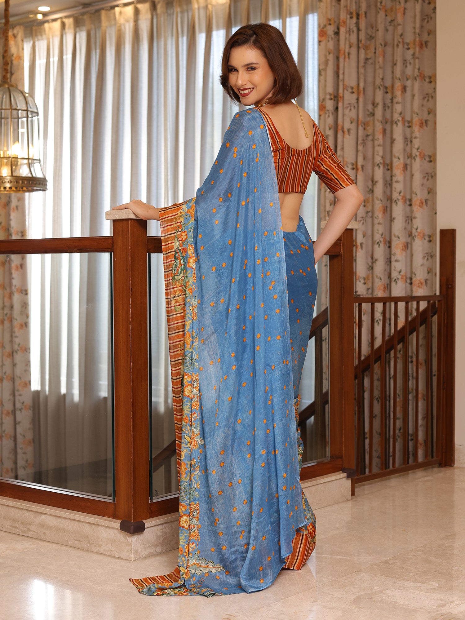 Aurelia Azure Blue and Rust Floral Buti Chinon Saree