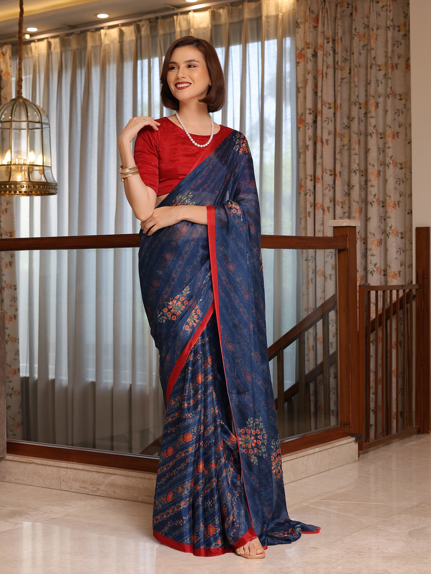 Evara Deep Navy Floral Buti Chinon Saree