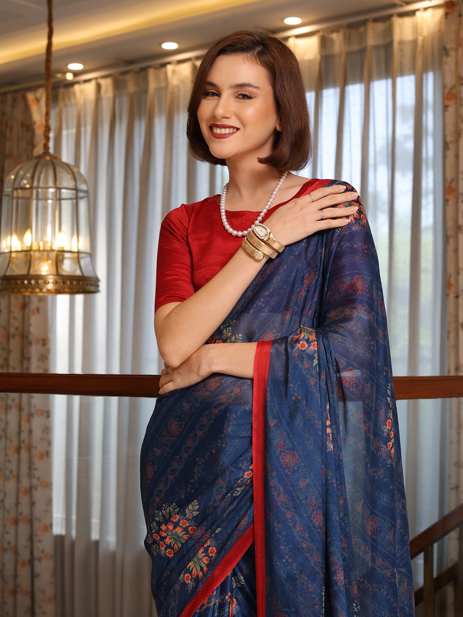 Evara Deep Navy Floral Buti Chinon Saree