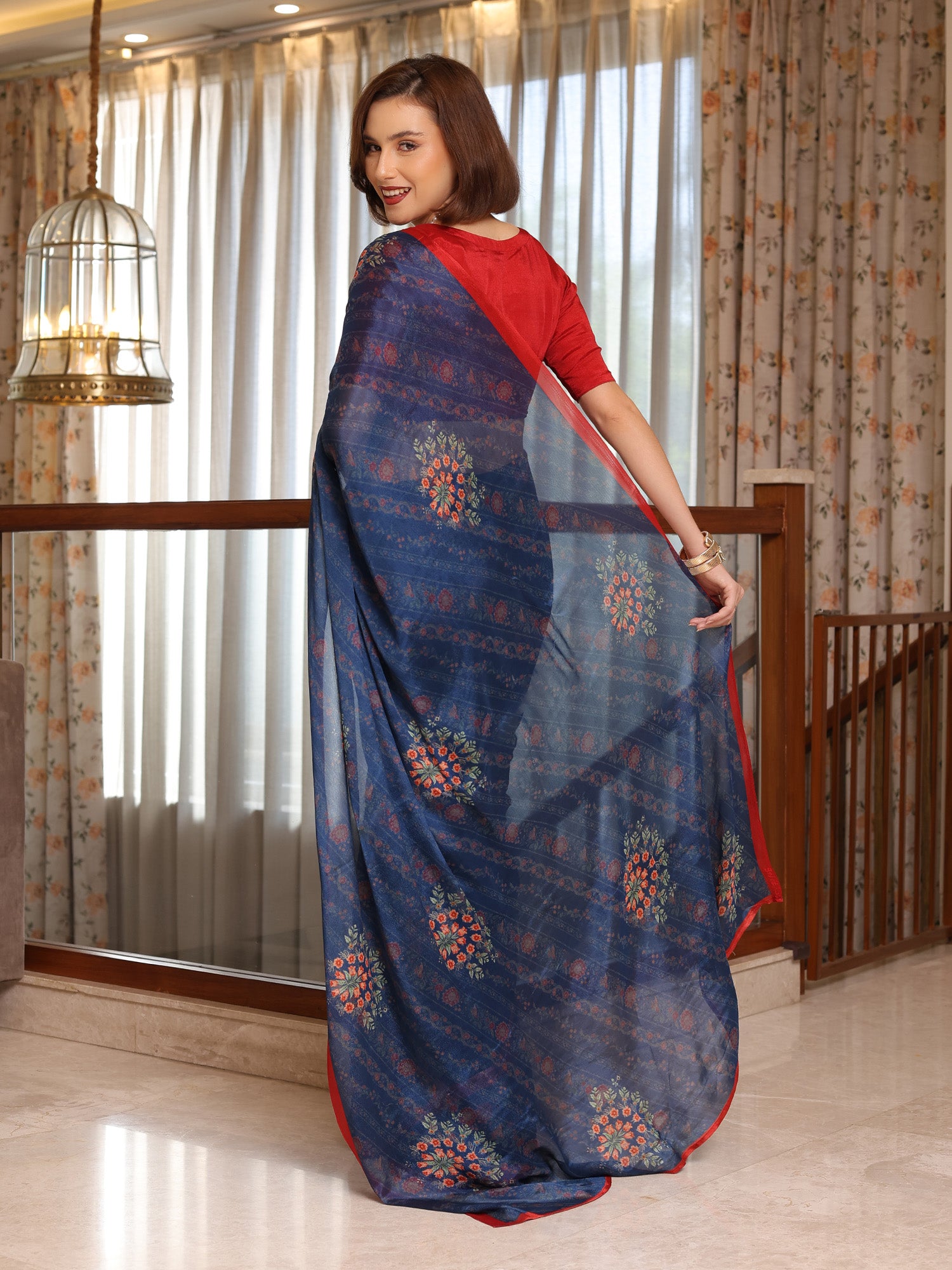 Evara Deep Navy Floral Buti Chinon Saree